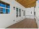 Spacious porch with wood ceiling and flooring, offering a perfect outdoor retreat with access to the house at 1417 Coretta Scott Bnd, Atlanta, GA 30318