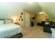 Spacious bedroom has sitting area and bedroom space with large closet at 2025 Goldmine Dr, Cumming, GA 30040