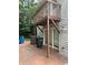 Exterior view of a patio with a deck and storage at 3 Fairway Nw Dr, Kennesaw, GA 30144
