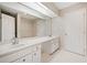 Bathroom with dual sinks, ample counter space, and a large mirror at 3 Fairway Nw Dr, Kennesaw, GA 30144