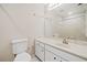 Bathroom featuring a single sink vanity with white marble top and hexagon tile flooring at 3 Fairway Nw Dr, Kennesaw, GA 30144