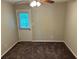 Bedroom featuring carpeted floors and a door to the exterior at 3 Fairway Nw Dr, Kennesaw, GA 30144