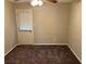 Bedroom featuring carpeted floors and a door to the exterior at 3 Fairway Nw Dr, Kennesaw, GA 30144