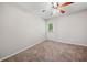 Bedroom with carpet, ceiling fan, and a door to the outside at 3 Fairway Nw Dr, Kennesaw, GA 30144