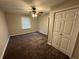 Bedroom with neutral paint, closet and plush carpet, creating a serene and inviting atmosphere at 3 Fairway Nw Dr, Kennesaw, GA 30144