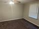Bedroom with natural light, plush carpeting, and neutral colors at 3 Fairway Nw Dr, Kennesaw, GA 30144