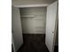 Open closet with shelving for organizing clothes and personal belongings at 3 Fairway Nw Dr, Kennesaw, GA 30144