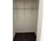 Walk-in closet featuring standard wire racking and neutral carpeting at 3 Fairway Nw Dr, Kennesaw, GA 30144