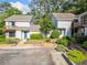 Charming townhouse complex featuring well-maintained landscaping at 3 Fairway Nw Dr, Kennesaw, GA 30144