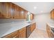 Well-equipped kitchen with oak cabinets, stainless steel appliances, and tile flooring at 3 Fairway Nw Dr, Kennesaw, GA 30144