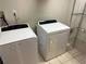Convenient laundry room with modern washer and dryer, offering functionality and efficiency at 3 Fairway Nw Dr, Kennesaw, GA 30144