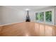 Spacious living room with hardwood floors, fireplace, and sliding glass doors for natural light at 3 Fairway Nw Dr, Kennesaw, GA 30144