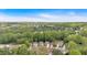 Aerial view of a cozy neighborhood with lush greenery and mature trees providing a peaceful atmosphere at 3321 Hampreston Nw Way, Kennesaw, GA 30144