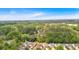 Aerial view of a residential neighborhood surrounded by lush greenery and trees, offering a serene environment at 3321 Hampreston Nw Way, Kennesaw, GA 30144