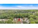 Aerial view of a neighborhood nestled among lush greenery, showcasing a peaceful and scenic setting at 3321 Hampreston Nw Way, Kennesaw, GA 30144