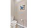 Powder room with neutral walls, a framed print, and classic design at 3321 Hampreston Nw Way, Kennesaw, GA 30144