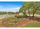 Community entrance sign surrounded by colorful flower beds, inviting residents and visitors alike to a welcoming neighborhood at 3321 Hampreston Nw Way, Kennesaw, GA 30144
