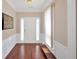 Inviting foyer with hardwood floors and natural light at 3321 Hampreston Nw Way, Kennesaw, GA 30144