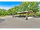 A covered picnic area with tables and green space offering an outdoor gathering spot at 3321 Hampreston Nw Way, Kennesaw, GA 30144