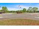 Well-maintained roundabout adorned with colorful flowers and surrounding trees, enhances the community's aesthetic appeal at 3321 Hampreston Nw Way, Kennesaw, GA 30144