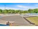 Outdoor skate park with ramps, rails, and various skating features surrounded by greenery and open space at 3321 Hampreston Nw Way, Kennesaw, GA 30144