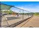 Outdoor splash pad area behind a chain link fence, featuring colorful water features and play structures at 3321 Hampreston Nw Way, Kennesaw, GA 30144