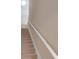 Carpeted stairway with white handrail leading to the upper level at 3321 Hampreston Nw Way, Kennesaw, GA 30144