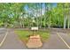 Scenic walking path surrounded by towering trees, offering residents a peaceful and refreshing outdoor experience at 3321 Hampreston Nw Way, Kennesaw, GA 30144