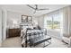 Serene bedroom with soft lighting, stylish furniture, and large windows, creating a tranquil retreat at 3543 Cedarvale Ct, Powder Springs, GA 30127