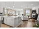 Bright and airy living room featuring an open concept design with modern finishes and a cozy fireplace at 3543 Cedarvale Ct, Powder Springs, GA 30127