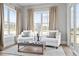 Cozy sitting area with comfortable chairs, natural light, and serene views at 3543 Cedarvale Ct, Powder Springs, GA 30127