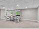 Finished basement with ping pong table and large living space at 1400 Squire Ln, Cumming, GA 30041