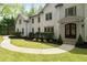 Home featuring lush landscaping and a pathway leading to the inviting front entrance at 1400 Squire Ln, Cumming, GA 30041