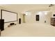 Finished basement with projector screen, speakers, and recessed lighting at 2049 Kinderton Manor Dr, Johns Creek, GA 30097