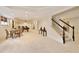 Finished basement with recessed lighting, dining table, pool table, and staircase at 2049 Kinderton Manor Dr, Johns Creek, GA 30097