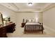 Bedroom with neutral color palette and carpeting, featuring a desk area at 2049 Kinderton Manor Dr, Johns Creek, GA 30097
