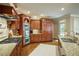 Well-equipped kitchen boasting granite countertops, stainless steel appliances, and ample cabinet space for storage at 2049 Kinderton Manor Dr, Johns Creek, GA 30097