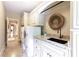 Laundry room with sink, washer, dryer, and storage at 2049 Kinderton Manor Dr, Johns Creek, GA 30097