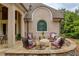 Inviting stone patio with comfortable seating, perfect for outdoor relaxation and entertaining at 2049 Kinderton Manor Dr, Johns Creek, GA 30097