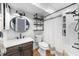 Well-lit bathroom boasting white subway tile, a modern vanity, and a shower with a rainfall showerhead at 2700 Sandstone Dr, Lawrenceville, GA 30043