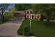 Well maintained two-story brick home with two car garage and lush green lawn and landscaping at 2700 Sandstone Dr, Lawrenceville, GA 30043