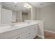 Bathroom featuring double sink vanity and shower/tub combo at 2995 Boulder Walk Se Ct, Atlanta, GA 30316