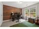 Bright room with guitars, and a wood panel wall at 2995 Boulder Walk Se Ct, Atlanta, GA 30316