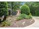 Entrance sign for Boulder Walk, surrounded by lush greenery at 2995 Boulder Walk Se Ct, Atlanta, GA 30316