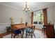 Charming dining room with hardwood floors, natural light, and classic furnishings, perfect for Gathering gatherings at 2995 Boulder Walk Se Ct, Atlanta, GA 30316