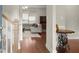 Inviting foyer features hardwood floors, staircase and view into the living room at 2995 Boulder Walk Se Ct, Atlanta, GA 30316
