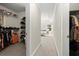 Hallway view into bedroom with walk-in closet, providing ample storage space at 2995 Boulder Walk Se Ct, Atlanta, GA 30316
