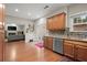 Bright eat-in kitchen featuring stainless dishwasher and access to the back patio at 2995 Boulder Walk Se Ct, Atlanta, GA 30316