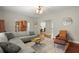 Spacious living room featuring hardwood floors, modern furniture, and ample natural light at 2995 Boulder Walk Se Ct, Atlanta, GA 30316