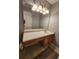 Bright bathroom with a vanity, ample counter space, and modern lighting at 3777 Harvest Dr, Decatur, GA 30034